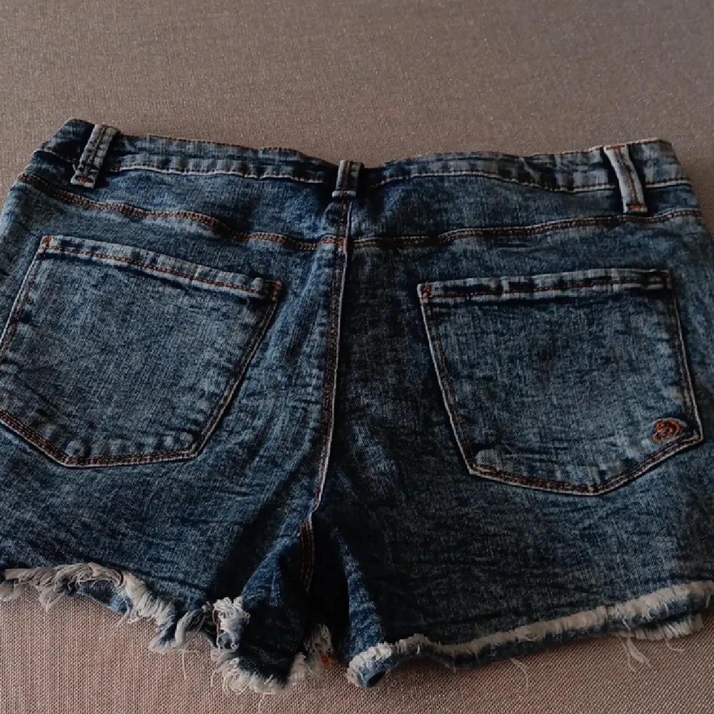 Indigo Rein Blue Distressed Jean Shorts
